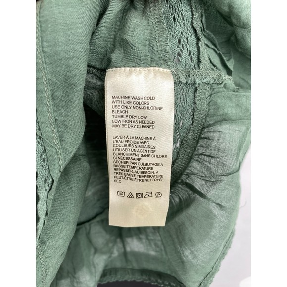 Free People NWT Fall in Love Lace Inset Ruffle Bottom Tee Washed Army Medium New - Picture 6 of 10